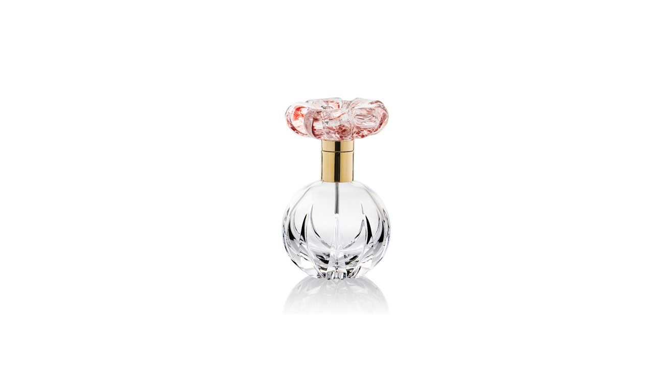 Clear perfume bottle w/ red flower and gold metal